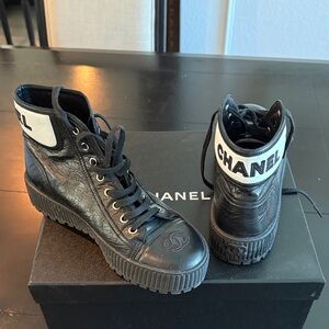 CHANEL Black Leather High-Top Lace-Up Sneakers with White Logo Collar